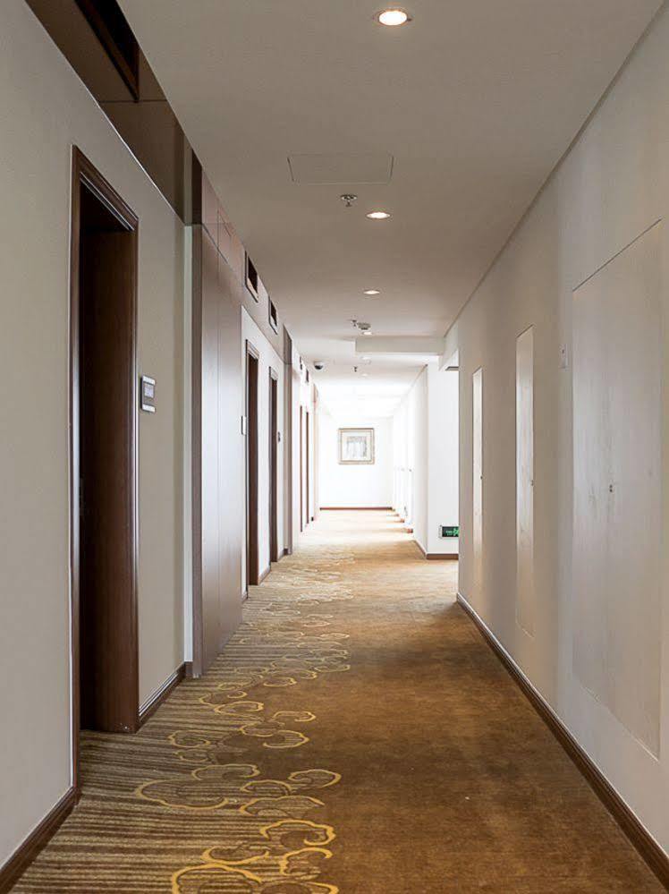 Coinfamily Hotel Shanghai Bagian luar foto